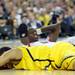 Michigan sophomore Trey Burke lies on the ground after foul during the second half of the national championship game at the Georgia Dome in Atlanta on Monday, April 8, 2013. Melanie Maxwell I AnnArbor.com